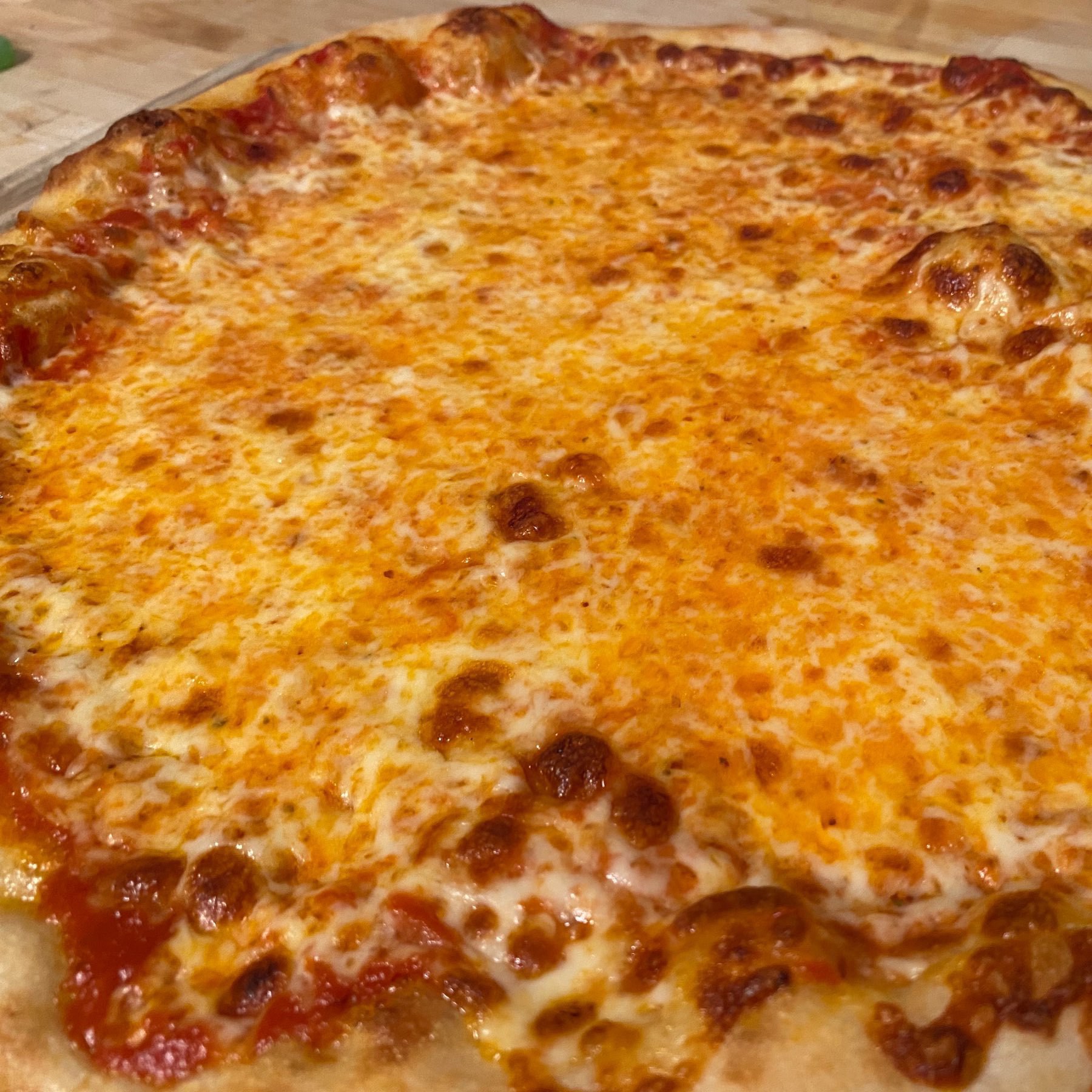 close up on home-made cheese pizza
