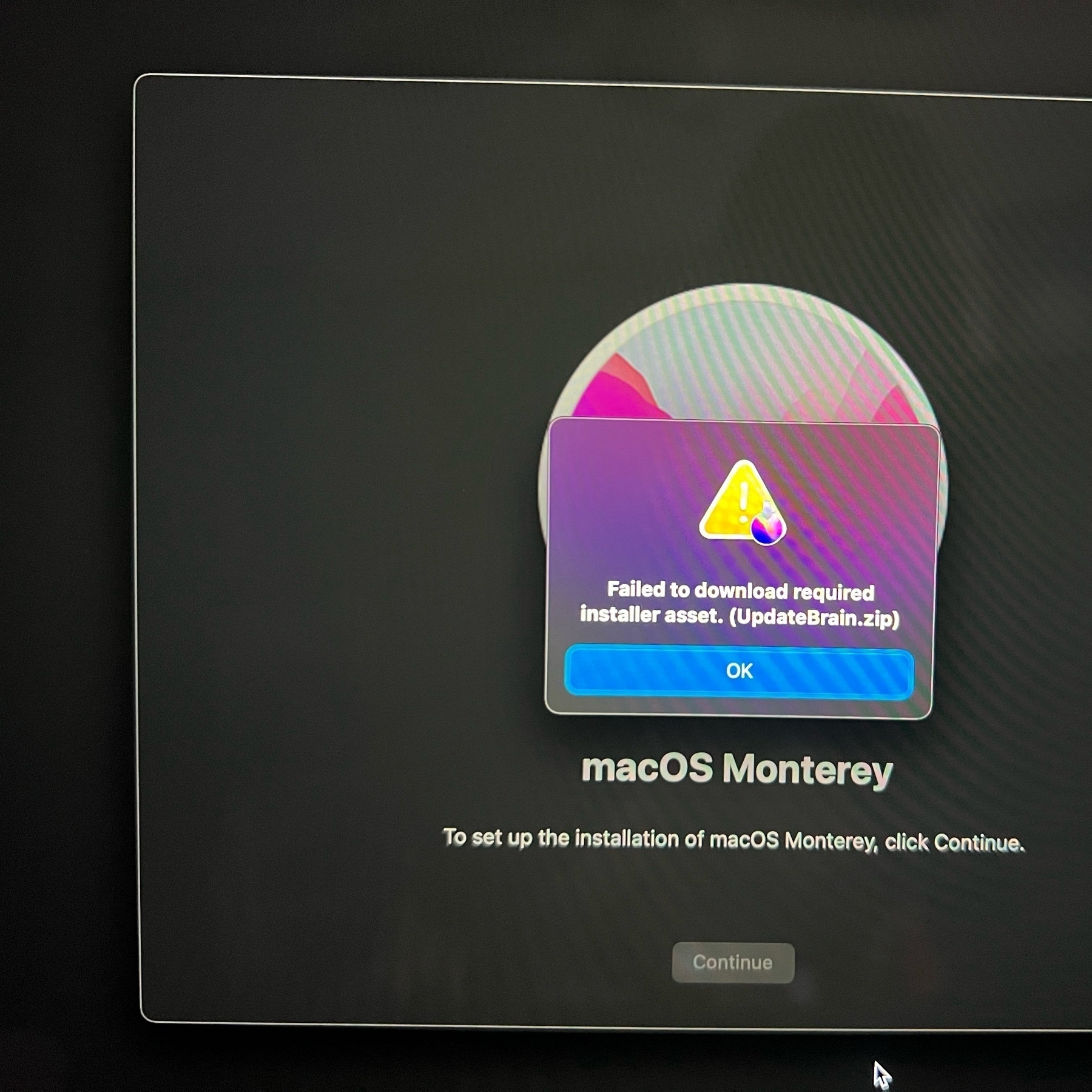Picture of Mac failing to install is with “UpdateBrain.zip” asset referenced.