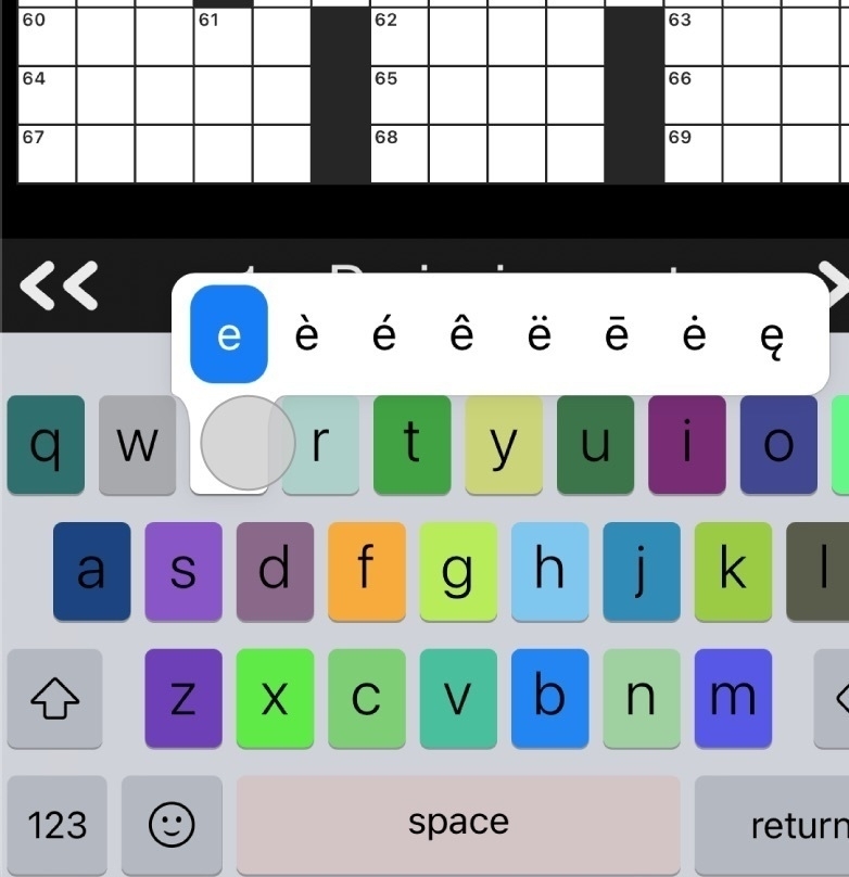 Screenshot of Black Ink crossword app for iOS with multi-colored custom keyboard